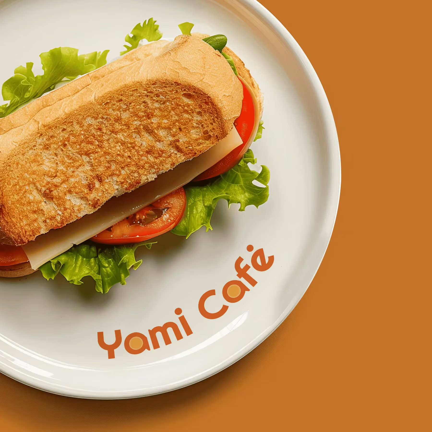 Yami Café branded plate with sandwich